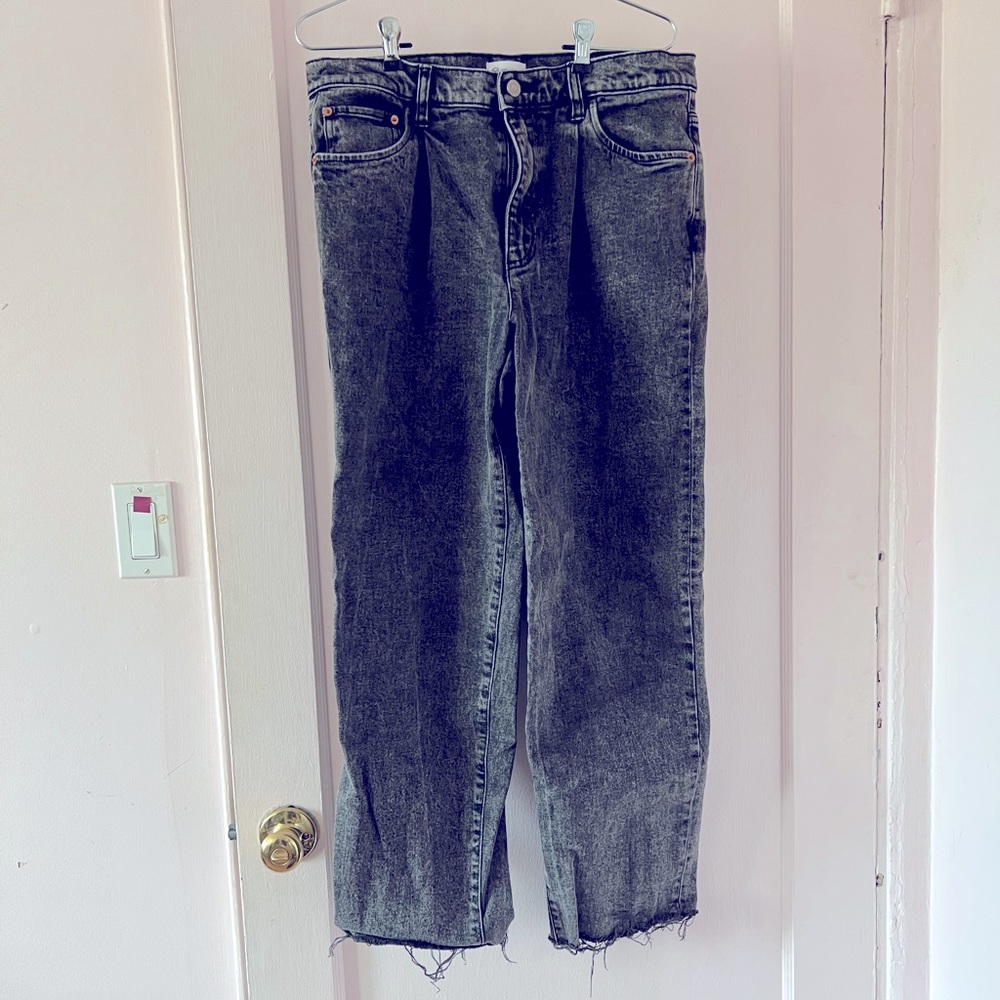 Black wide leg jeans with distressed cuffs